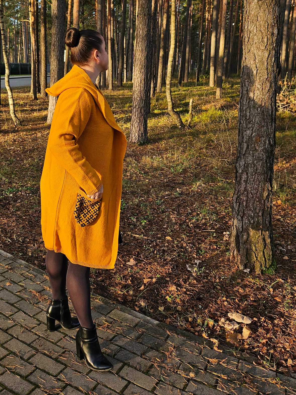 Vilnas mētelis ar rakstainām kabatām