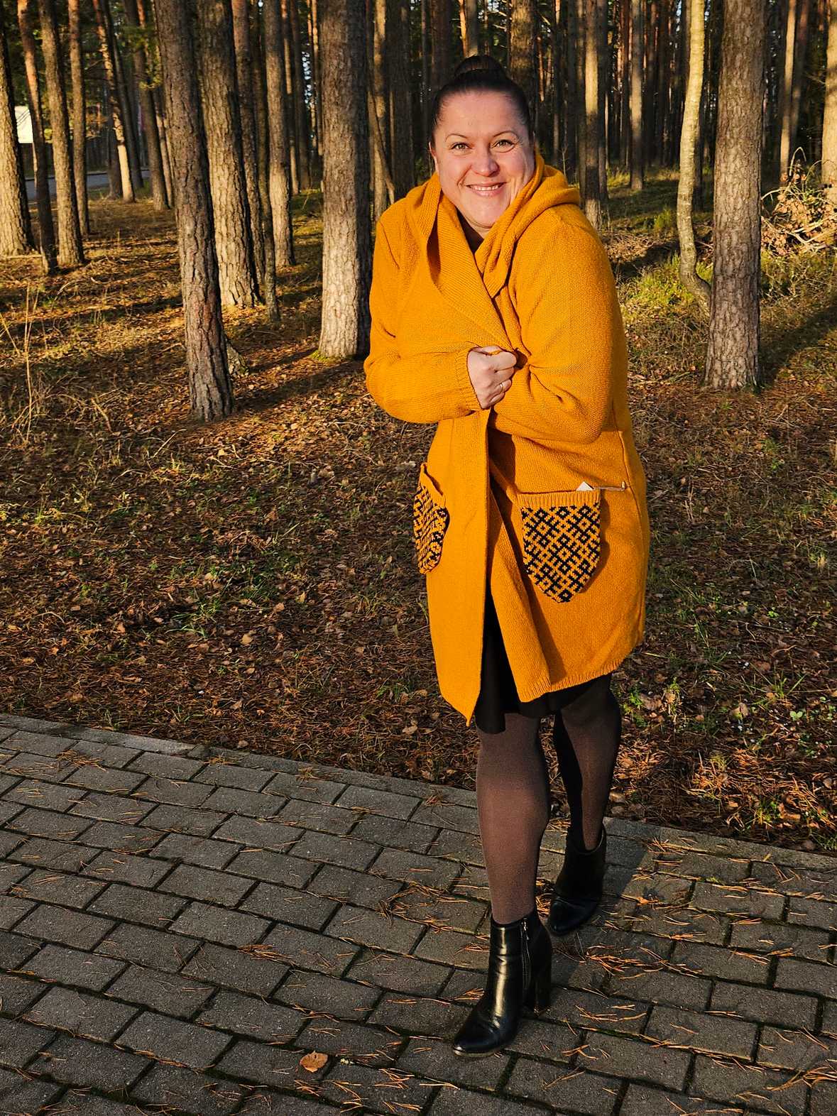 Vilnas mētelis ar rakstainām kabatām