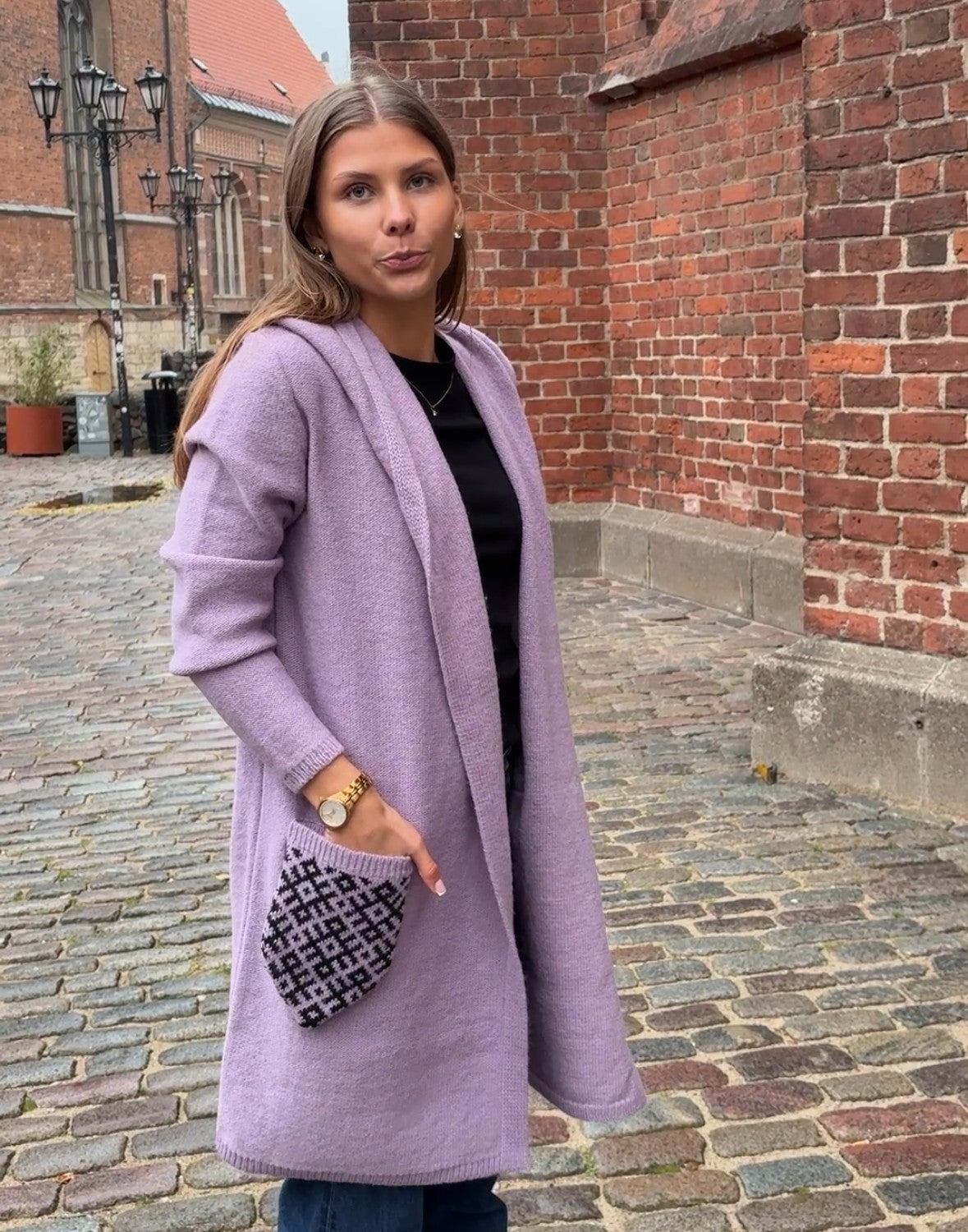 Vilnas mētelis ar rakstainām kabatām